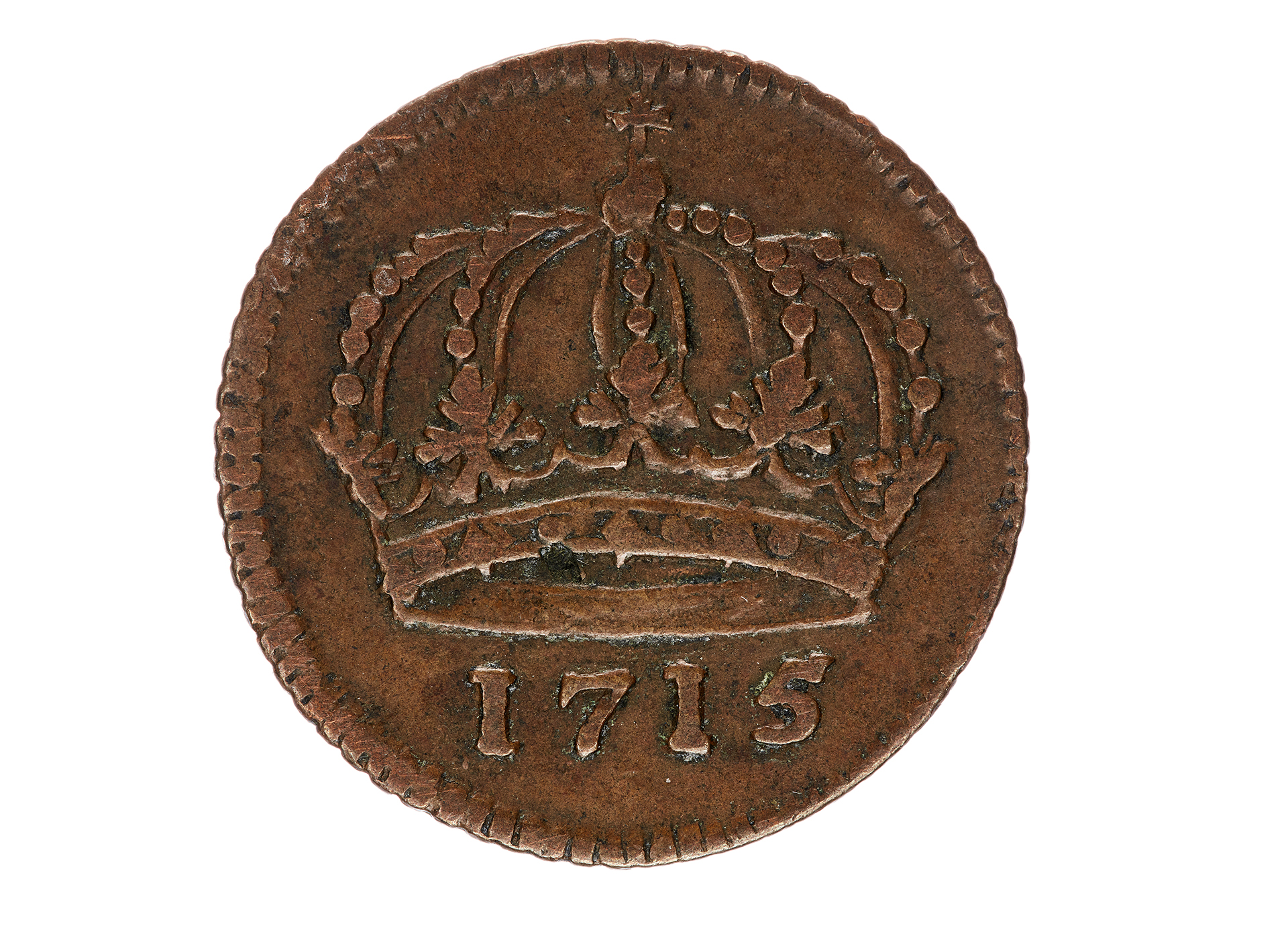 Kopparmynt med en kunglig krona och årtalet 1715.