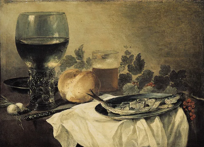 En tavla föreställande ett stilleben med ett glas vin, en fisk, ett glas öl mm.